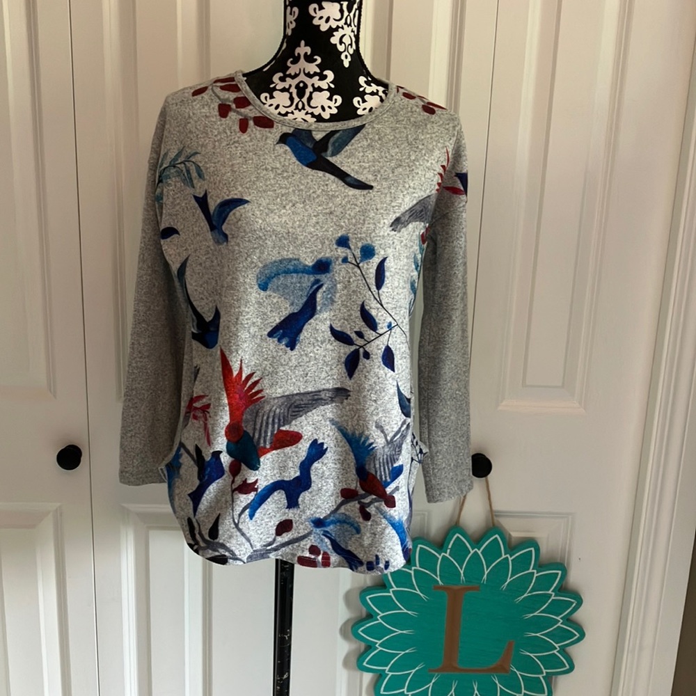 Gray Papillon sweater with bird pattern with silver exposed zip down back.